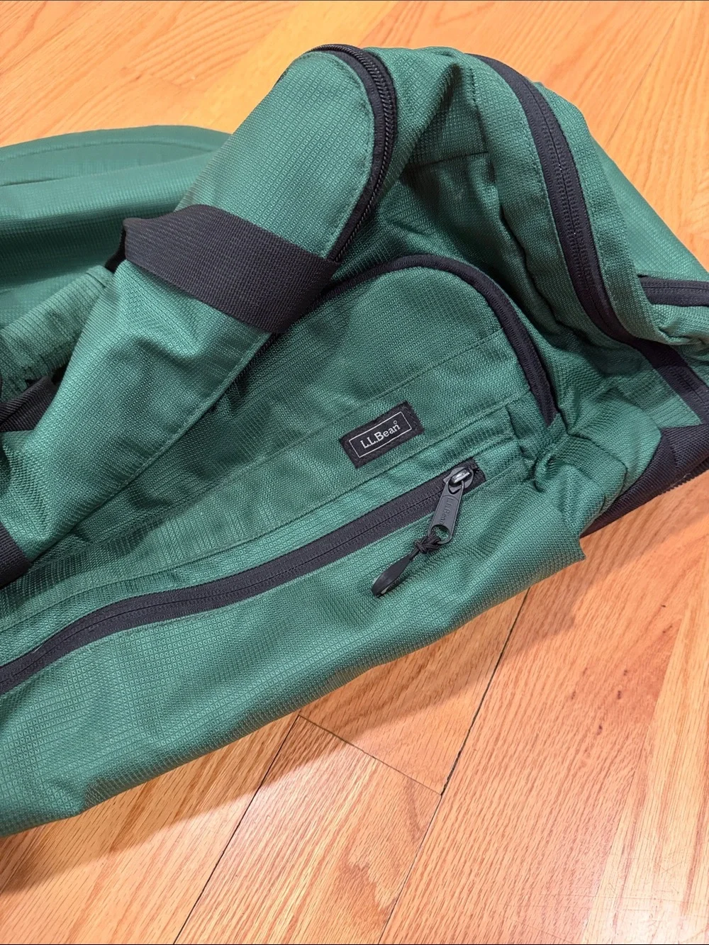 L.L. Bean dark Green rolling Duffel Bag